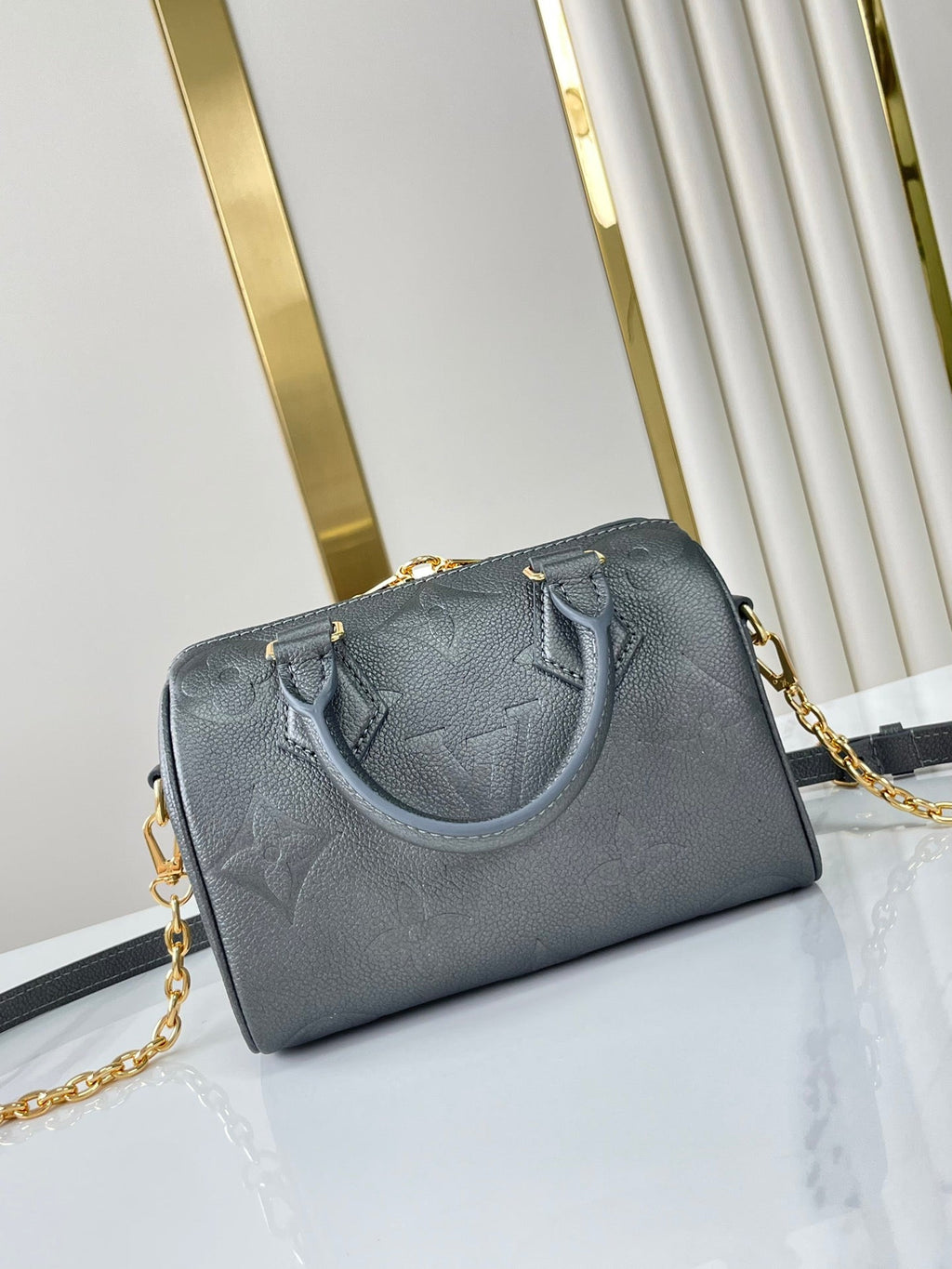 SPEEDY BANDOULIÈRE 20 EN GUN METAL MONOGRAMME EMPREINTE GOLD QUINCAILLERIE