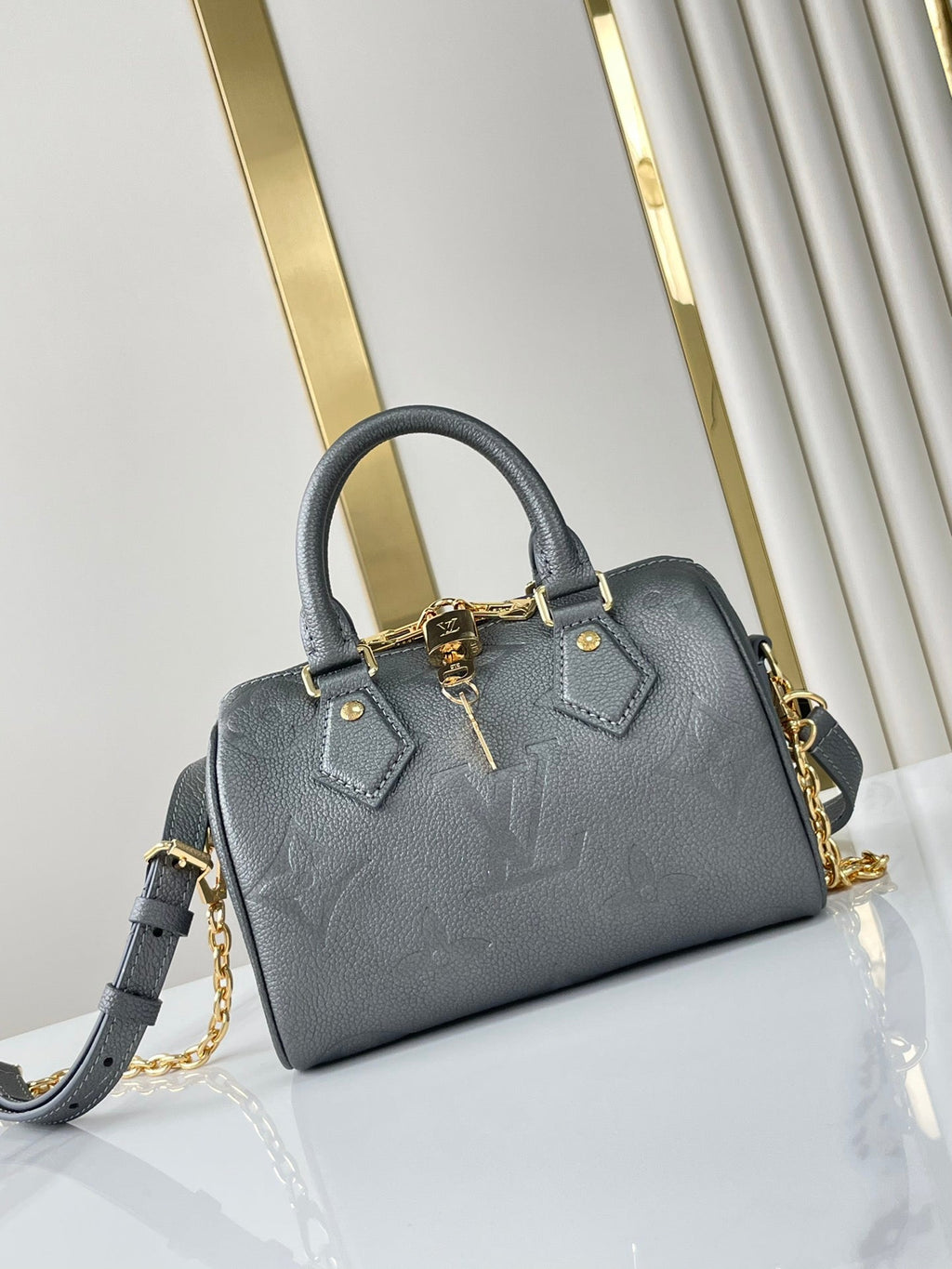 SPEEDY BANDOULIÈRE 20 EN GUN METAL MONOGRAMME EMPREINTE GOLD QUINCAILLERIE