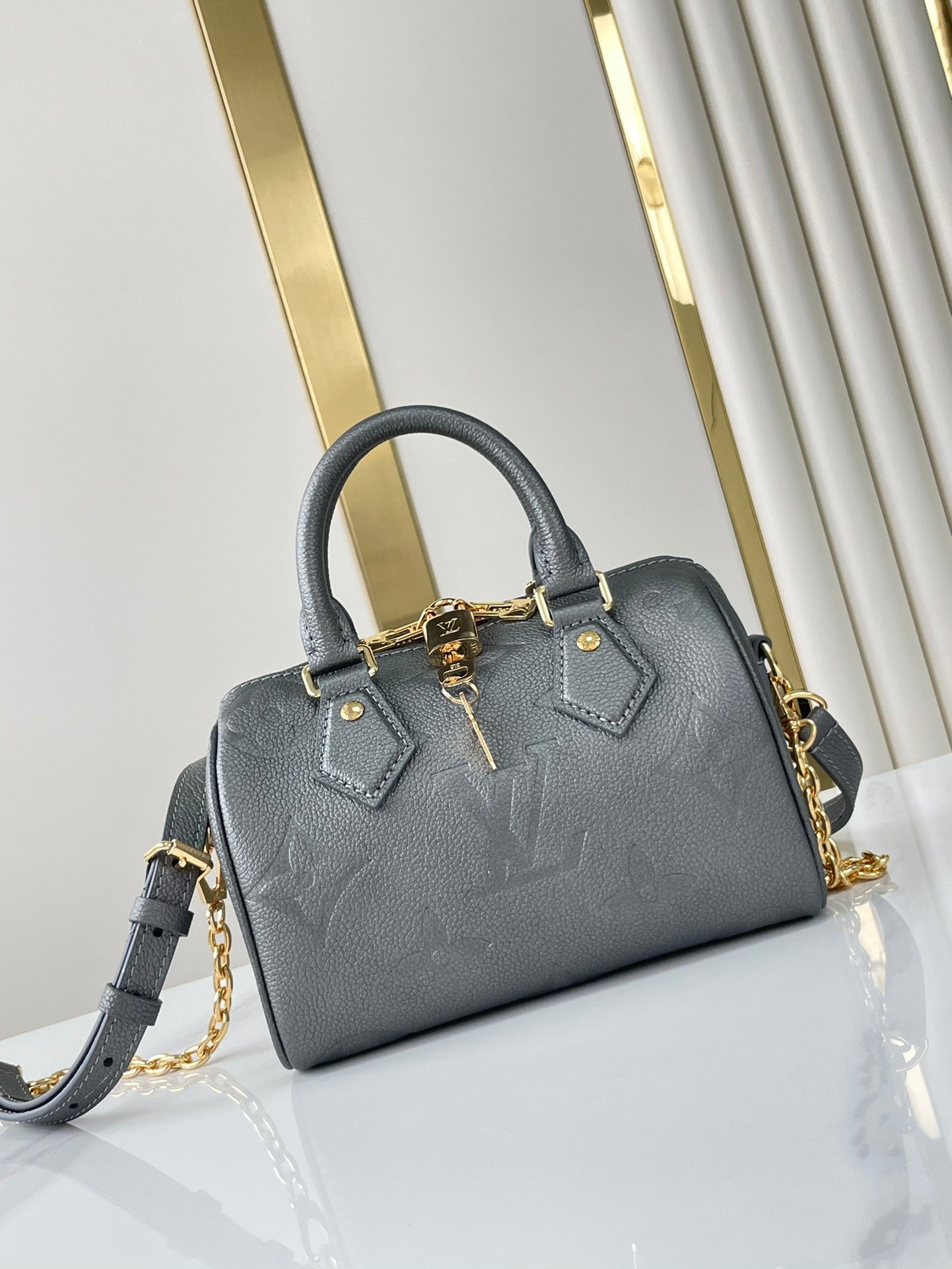 SPEEDY BANDOULIÈRE 20 EN GUN METAL MONOGRAMME EMPREINTE GOLD QUINCAILLERIE