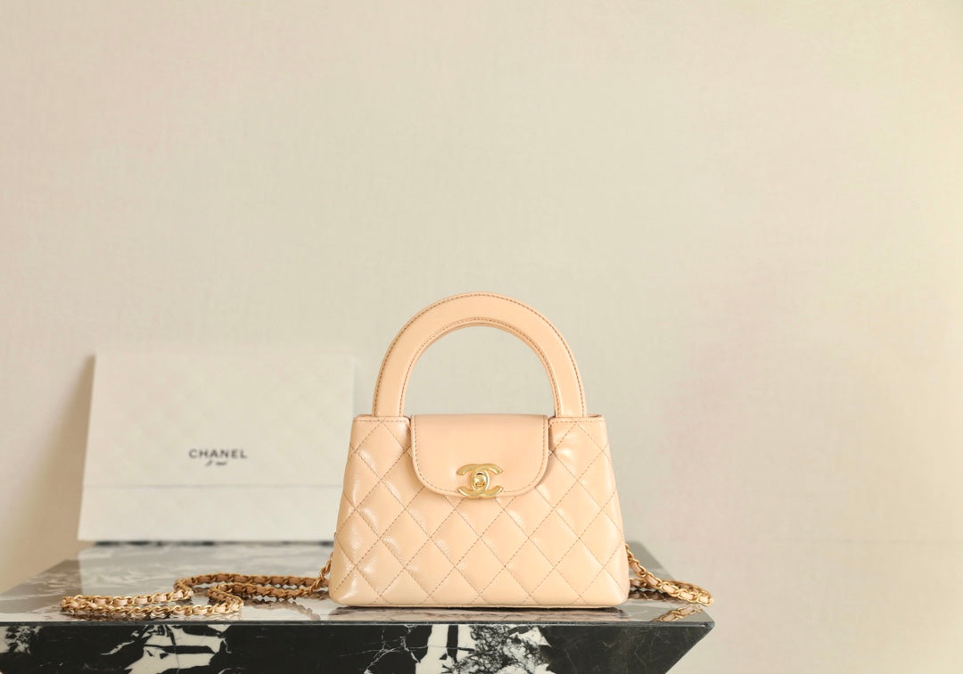 SAC CABAS KELLY CC 24K NANO 19CM EN CUIR D'AGNEAU VERNI BEIGE