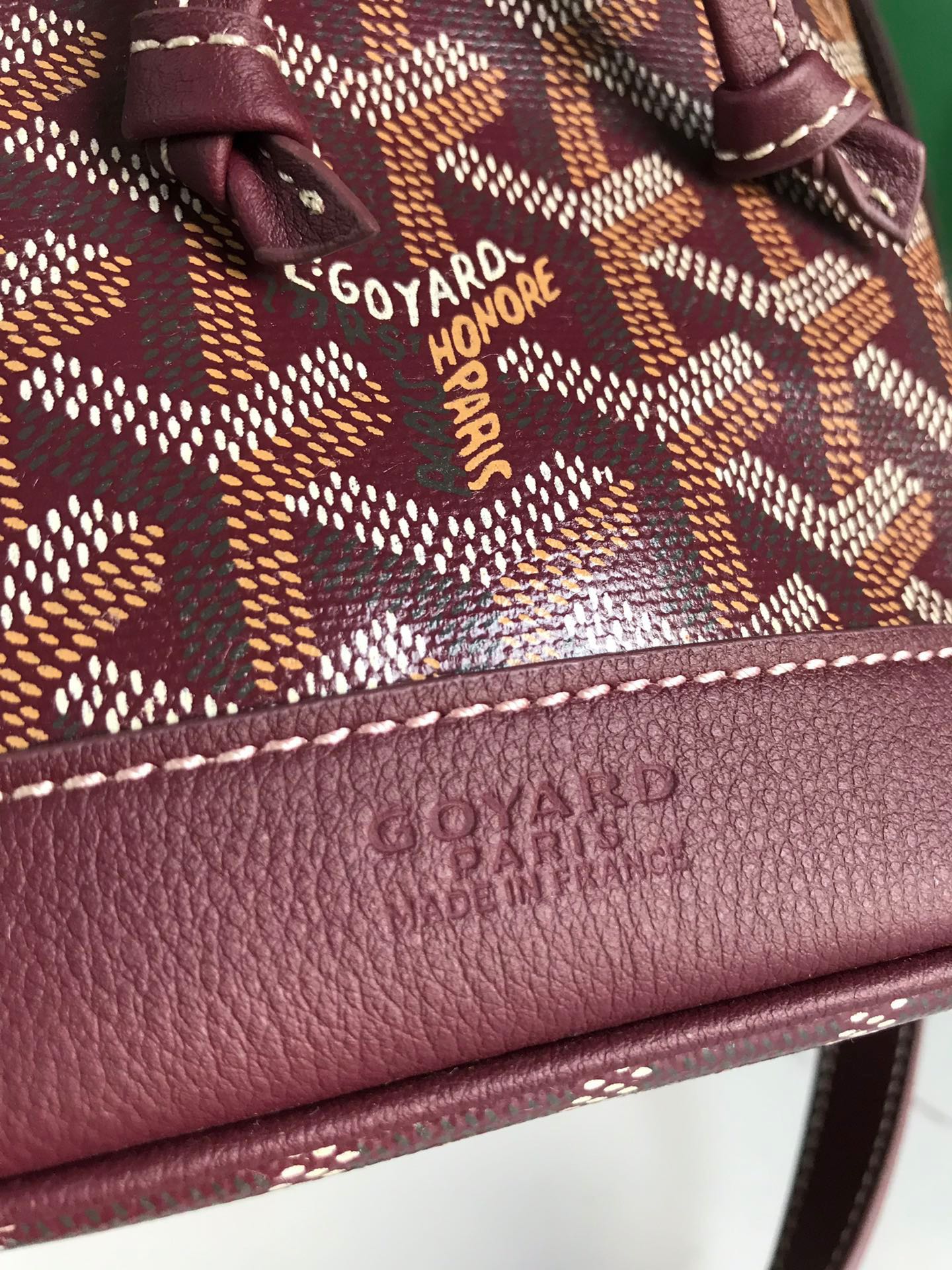 SAC SEAU PETIT FLOT 22 EN TOILE GOYARDINE ROUGE VIN ET BORDURE EN CUIR D'AGNEAU