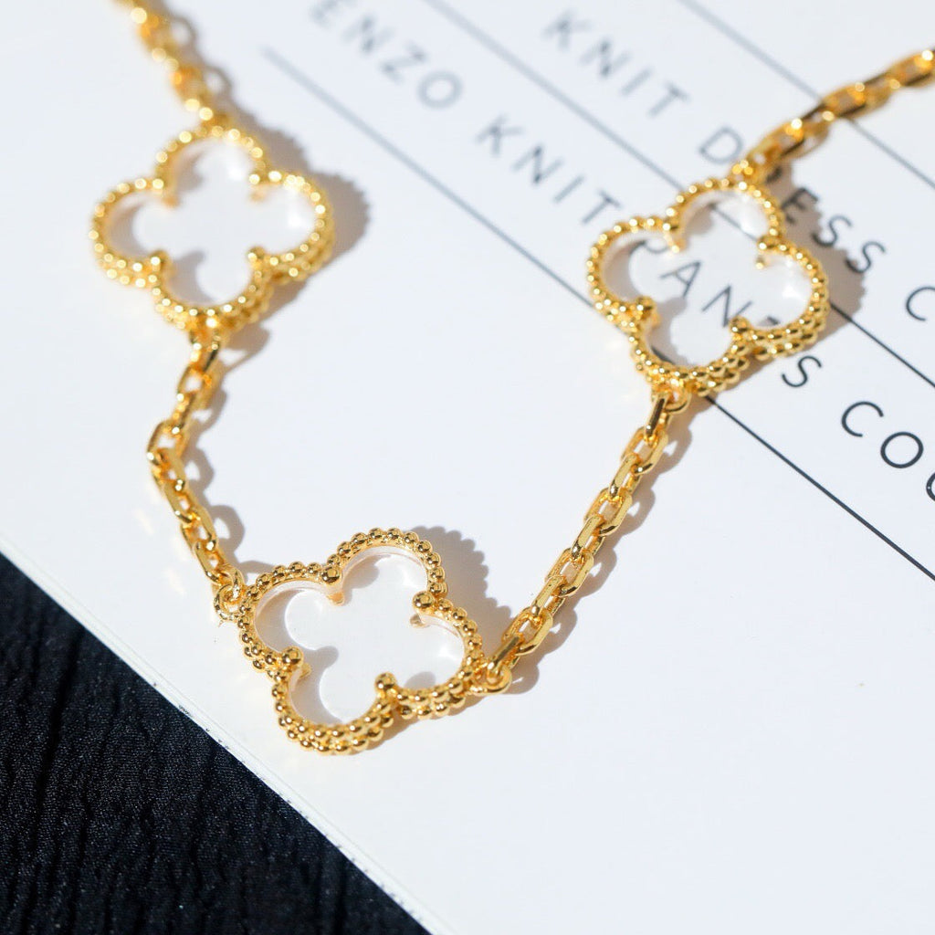 BRACELET EN OR ROSE ET CRISTAL DE ROCHE À 5 MOTIFS TRÈFLE