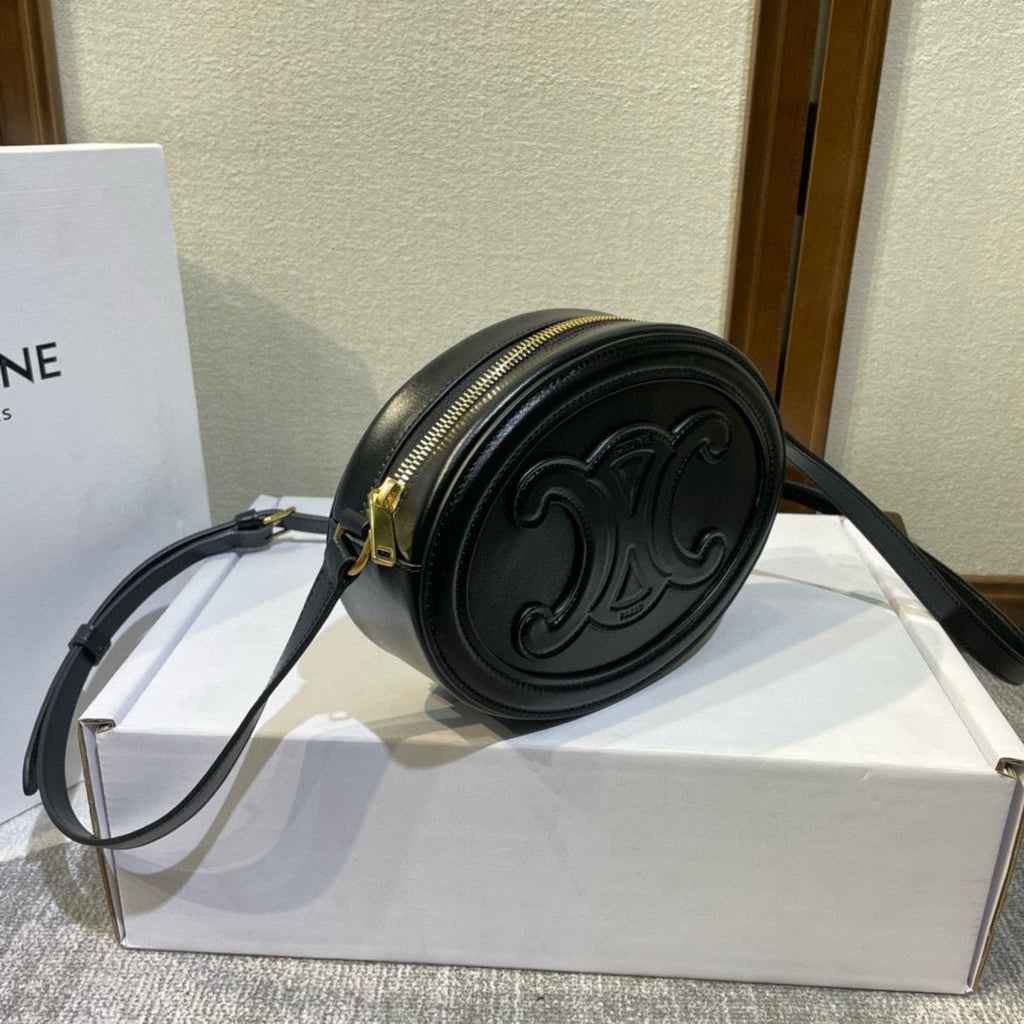 SAC OVALE 20 EN CUIR DE VEAU LISSE NOIR CANNELLE