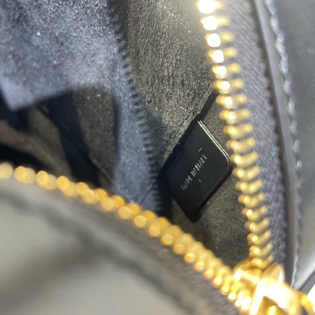 SAC OVALE 20 EN CUIR DE VEAU LISSE NOIR CANNELLE
