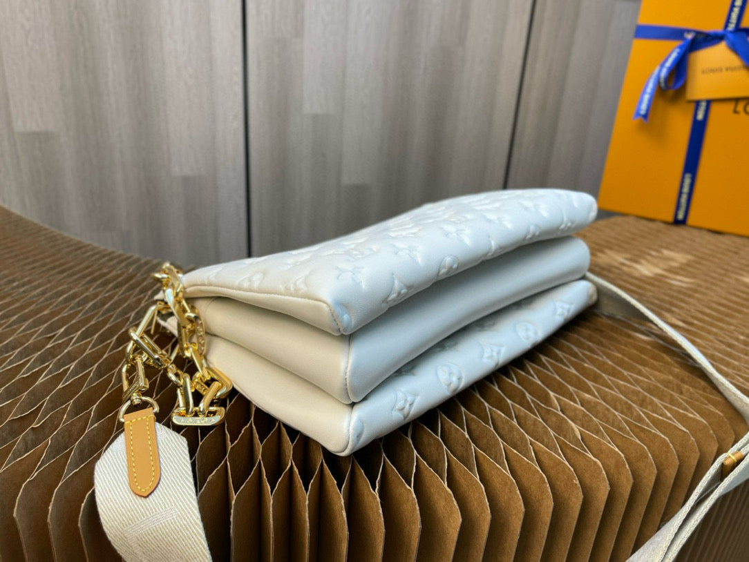 COUSSIN PM 26CM CREAM MONOGRAM EMPREINTE CALFSKIN