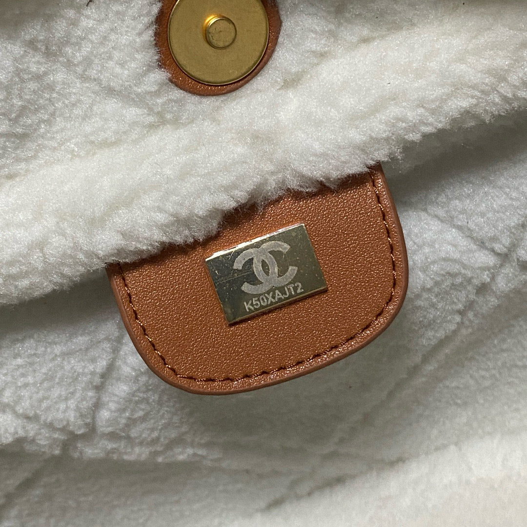 CC 22 SAC 35CM PEAU D'AGNEAU PEAU LAINE MARRON BLANC