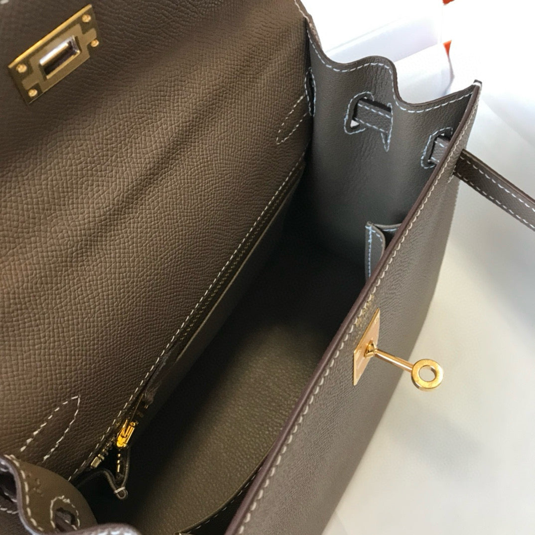 HM KELLY 25 ÉTOUPÉ CUIR EPSOM QUINCAILLERIE DORÉ