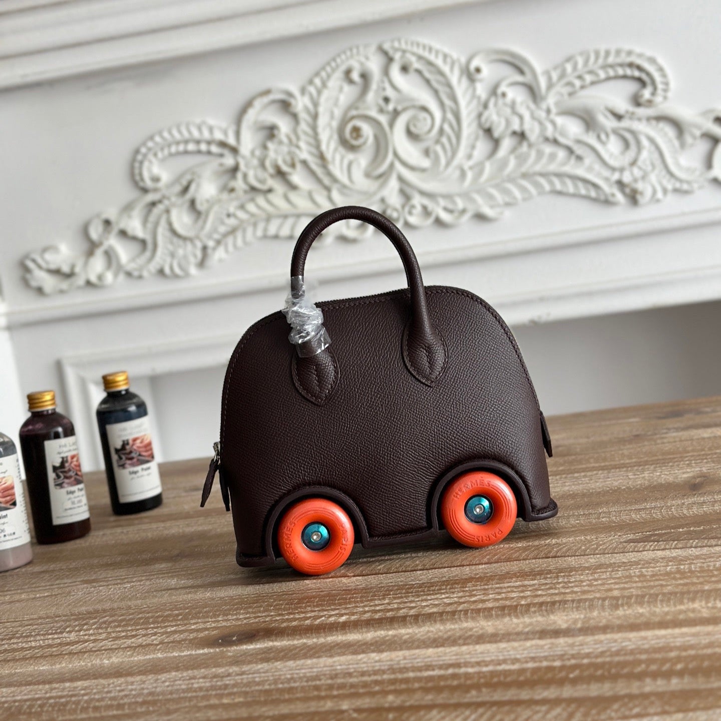 HM BOLIDE MINI 19CM BURGUNDY EPSOM LEATHER ON ORANGE WHEELS