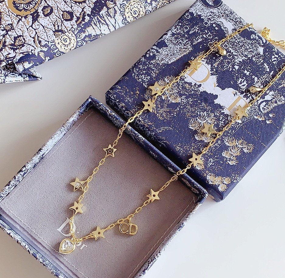 COLLIER CD STAR LOVE AVEC LE MÊME MATÉRIAU