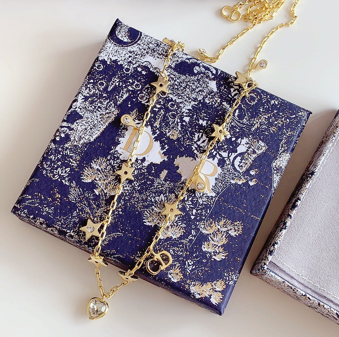 COLLIER CD STAR LOVE AVEC LE MÊME MATÉRIAU