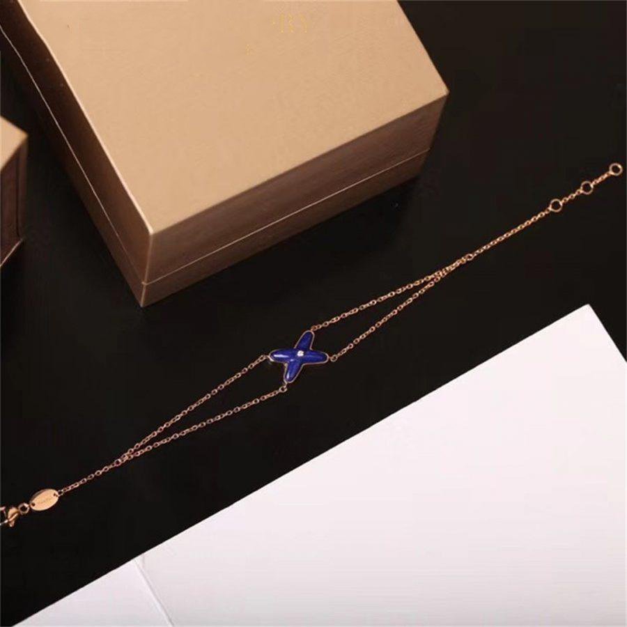 HOLLOW DESIGN FOUR-LEAF CLOVER FLOWER SHAPE RING