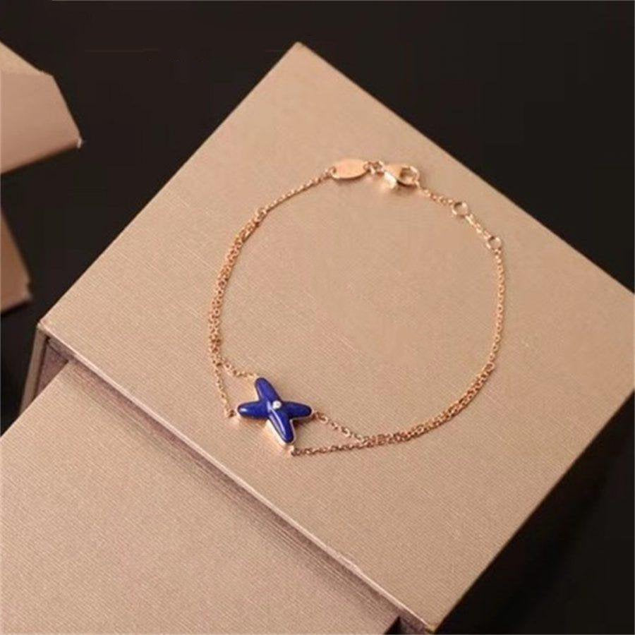 HOLLOW DESIGN FOUR-LEAF CLOVER FLOWER SHAPE RING