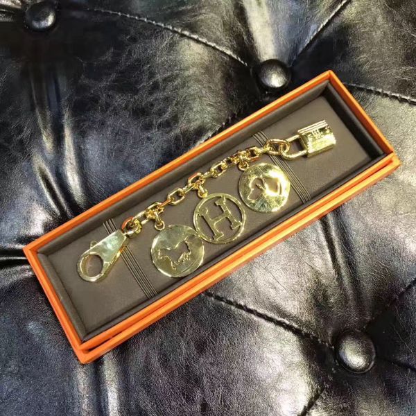 CHARME DE SAC BRELOQUE EN OR HM