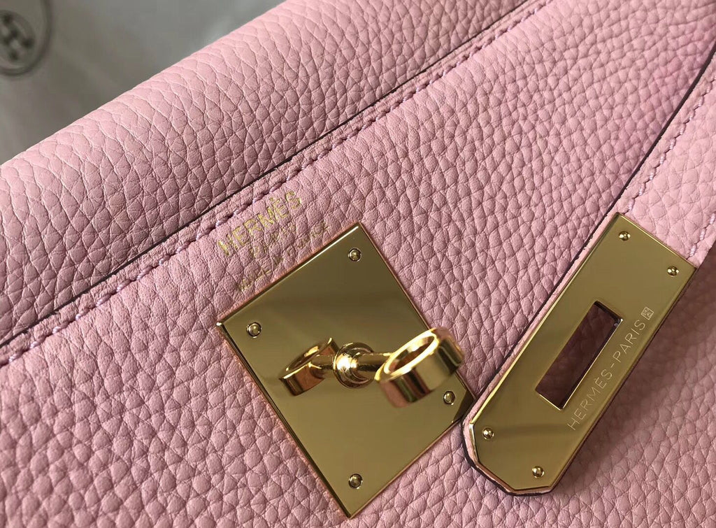 Sac HM Kelly 28 cm en cuir Togo rose et accastillage doré