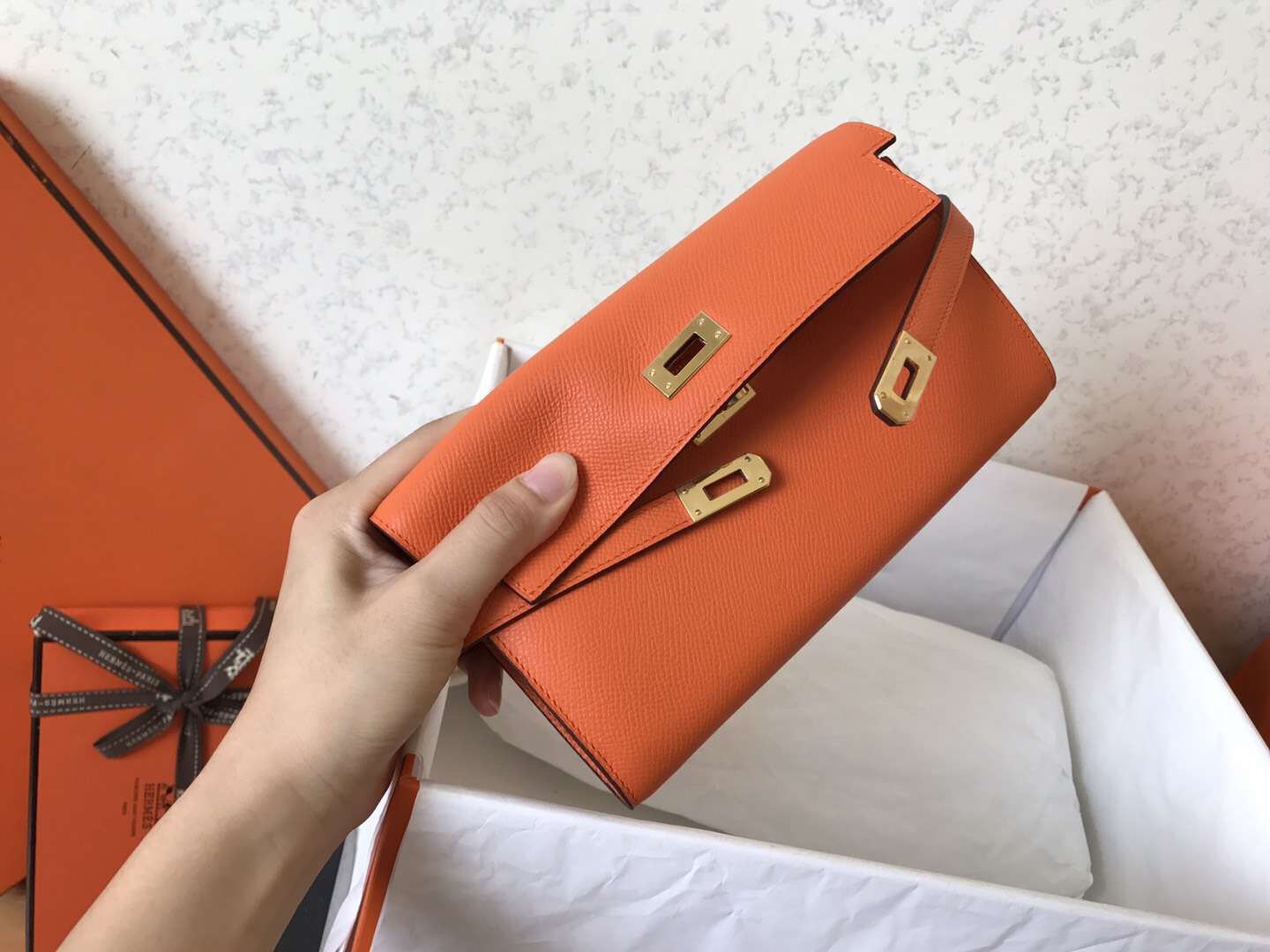 PORTEFEUILLE LONG KELLY 20CM CUIR EPSOM ORANGE