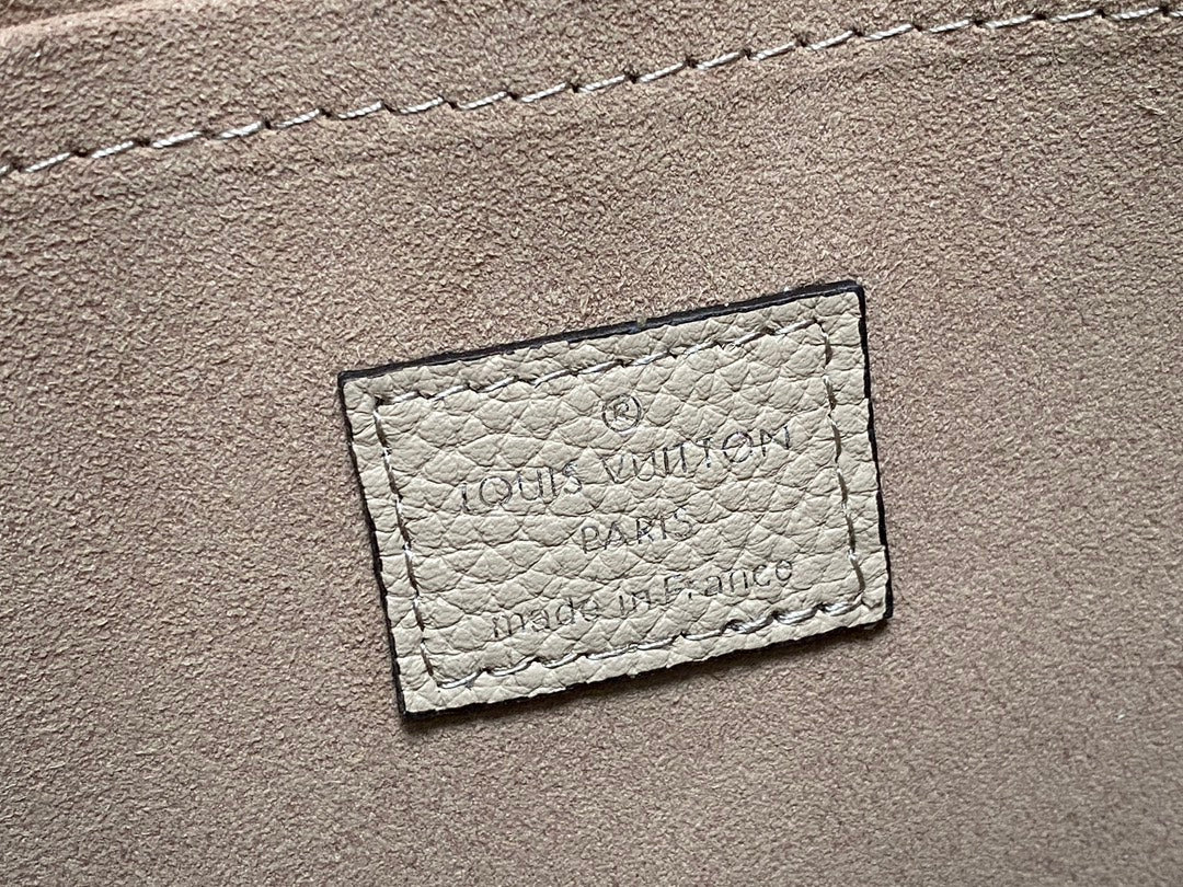 HAND IT ALL PM 29CM CUIR DE VEAU MAHINA BEIGE FONCÉ