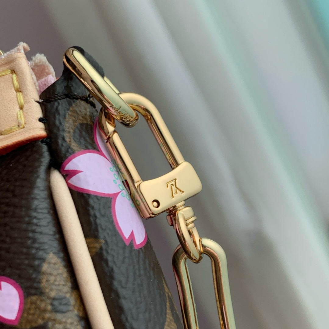 LV X TM POCHETTE ACCESSOIRES 22CM TOILE MONOGRAMME FLEUR DE CERISIER MARRON SAKURA