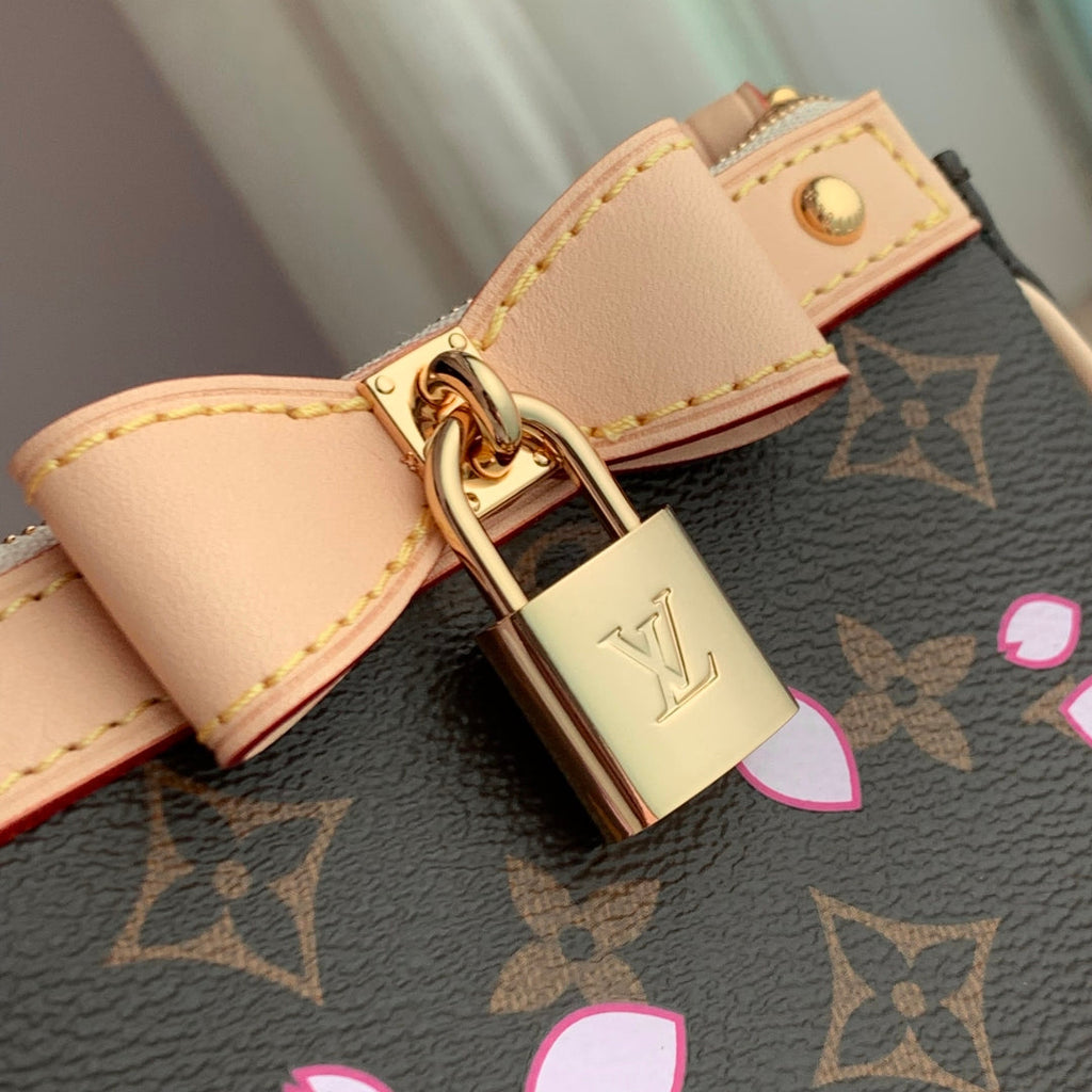 LV X TM POCHETTE ACCESSOIRES 22CM TOILE MONOGRAMME FLEUR DE CERISIER MARRON SAKURA