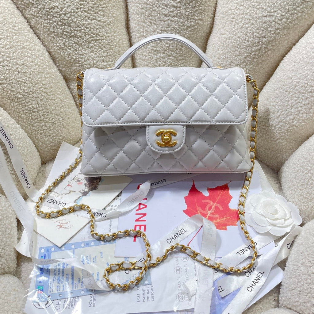 CC 25P SAC À RABAT MOYEN 25 CM POIGNÉE SUPÉRIEURE CUIR DE VEAU GRIS QUINCAILLERIE DORÉ