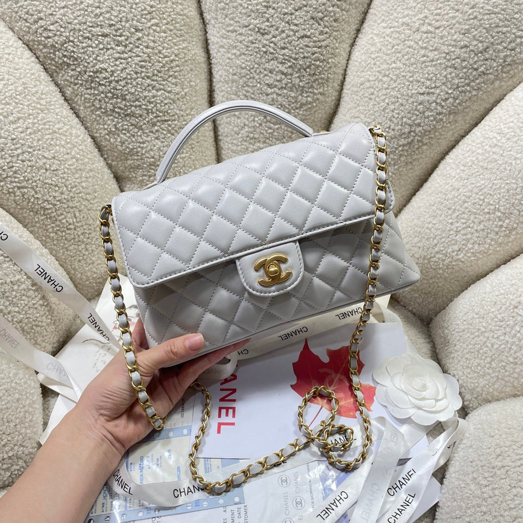 CC 25P SAC À RABAT MOYEN 25 CM POIGNÉE SUPÉRIEURE CUIR DE VEAU GRIS QUINCAILLERIE DORÉ