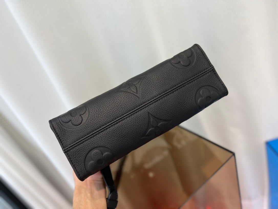 ONTHEGO 25 EAST WEST BLACK MONOGRAM EMPREINTE