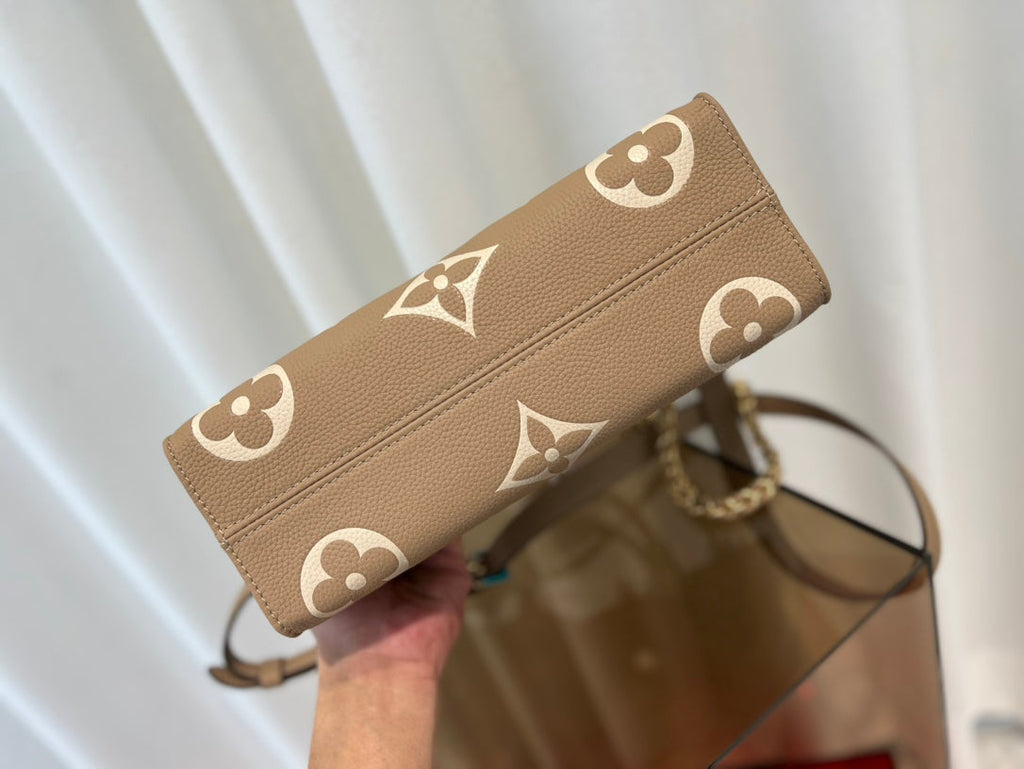 ONTHEGO 25 EAST WEST DA MONOGRAMME BICOLORE EMPREINTE