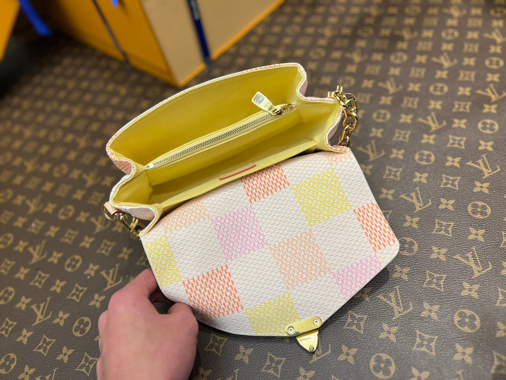 POCHETTE MÉTIS EAST WEST 21,5 PÊCHE DAMIER TOILE CÔTELÉE