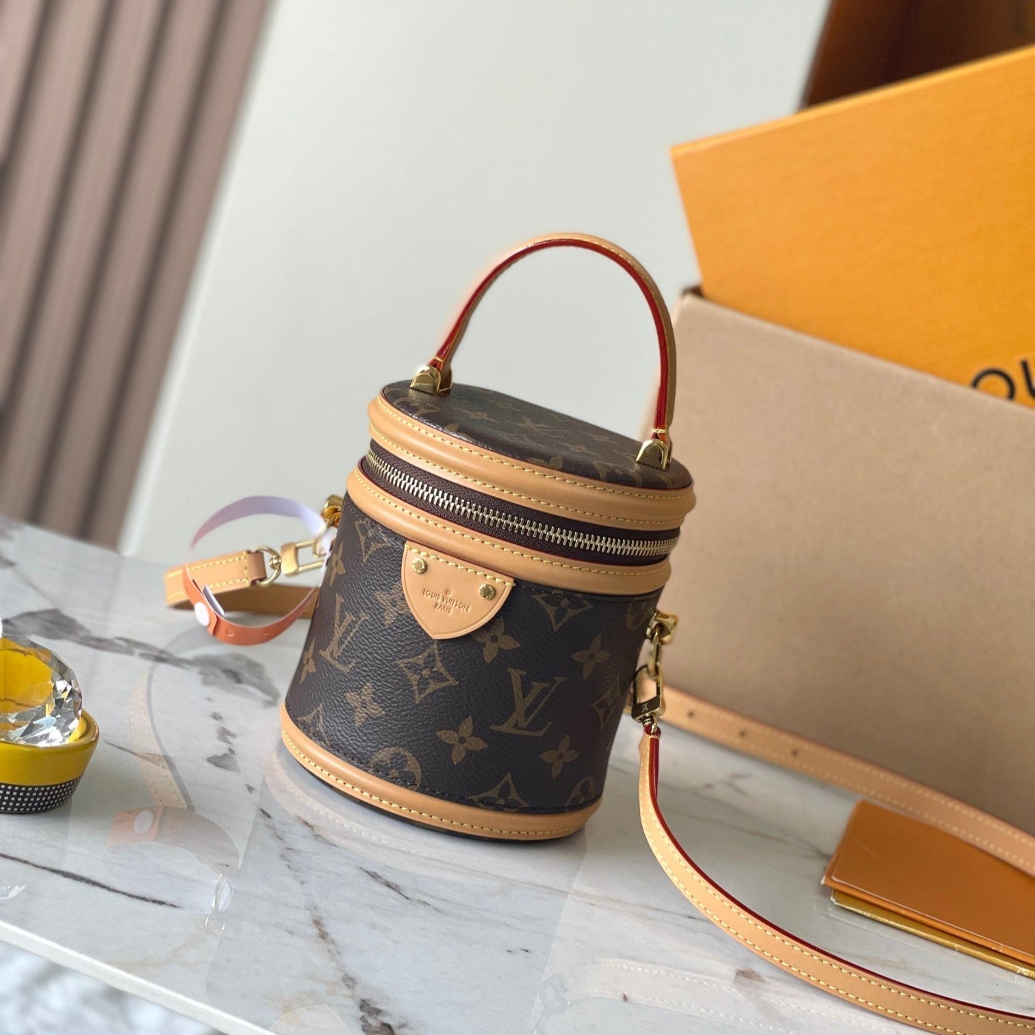 CANNES NANO 14 EN TOILE MONOGRAMME MARRON ET GARNITURES EN CUIR