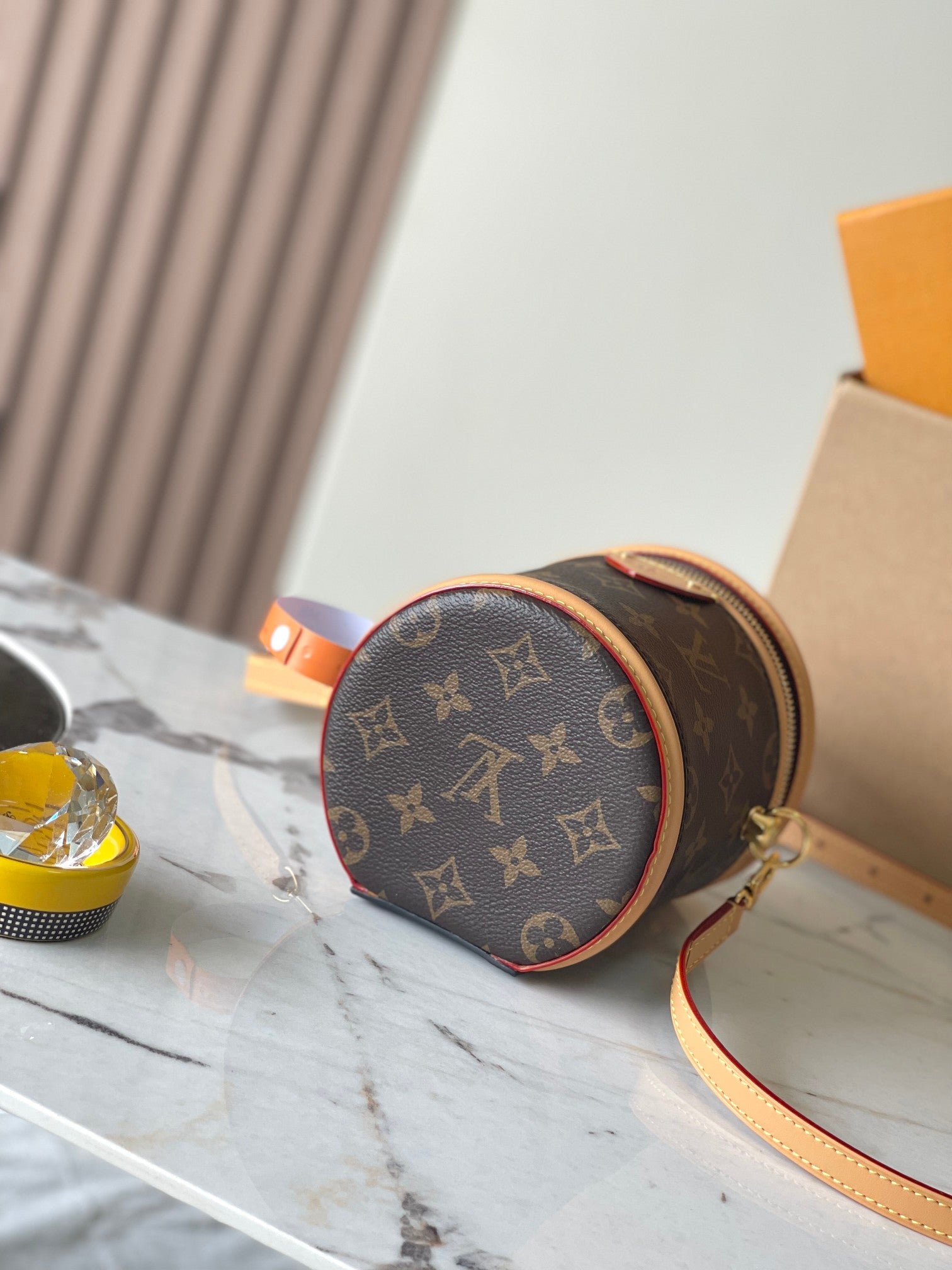 CANNES NANO 14 EN TOILE MONOGRAMME MARRON ET GARNITURES EN CUIR