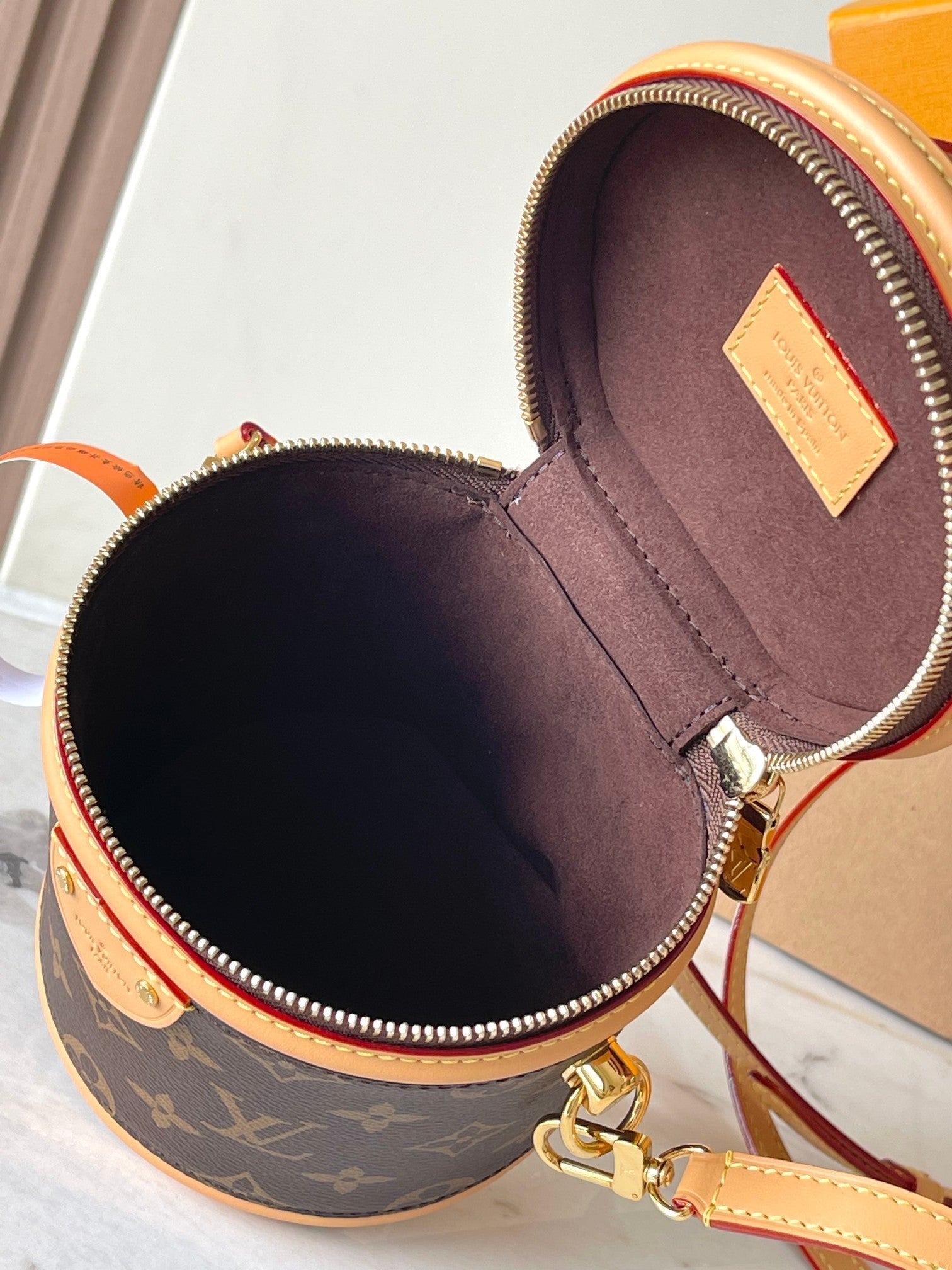 CANNES NANO 14 EN TOILE MONOGRAMME MARRON ET GARNITURES EN CUIR