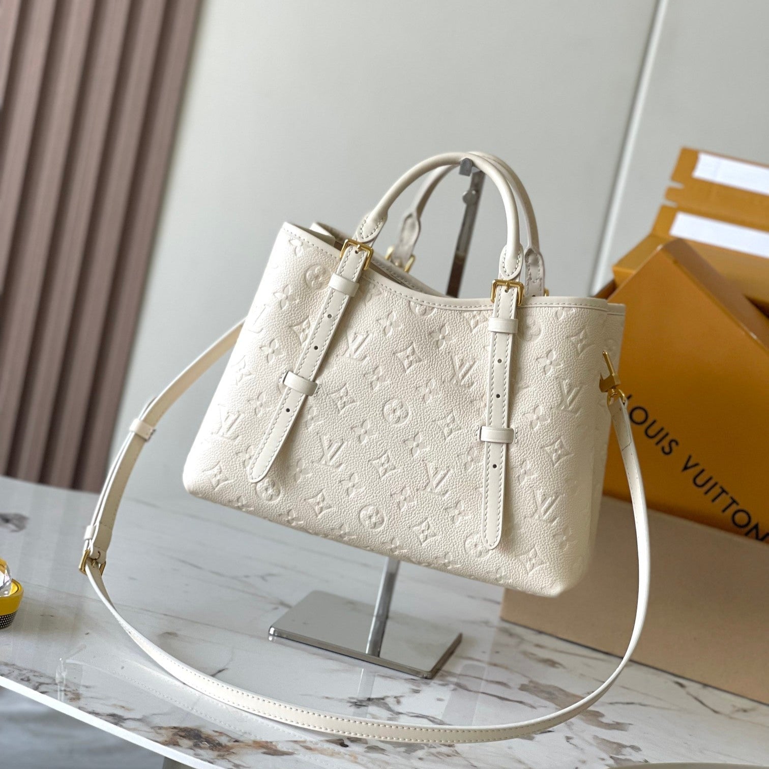 SAC BABYLONE 31 EN CUIR EMPREINTE MONOGRAMME BLANC