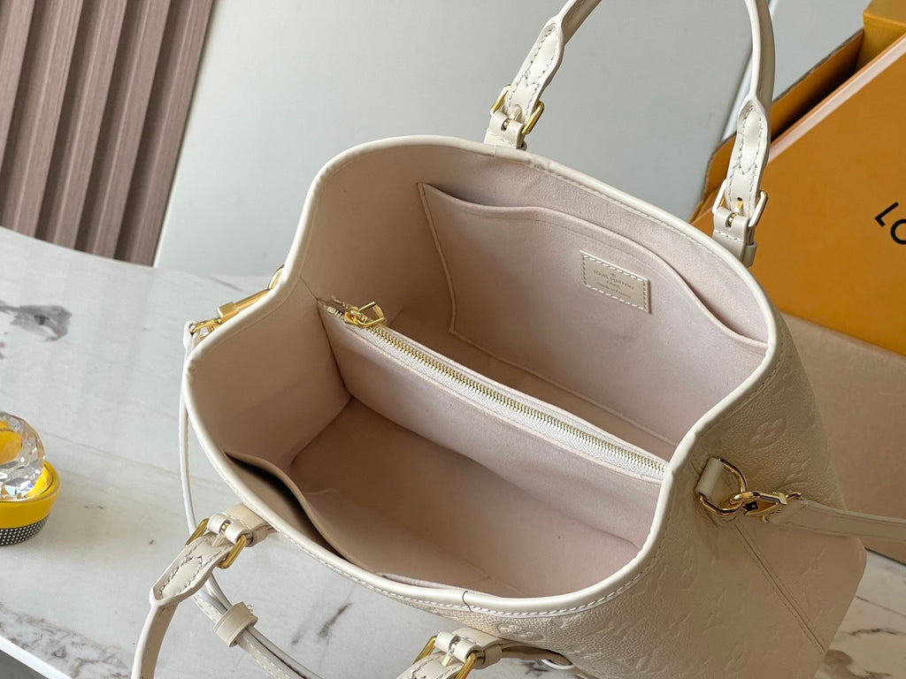 SAC BABYLONE 31 EN CUIR EMPREINTE MONOGRAMME BLANC