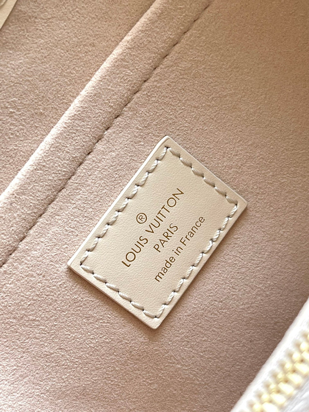 SAC BABYLONE 31 EN CUIR EMPREINTE MONOGRAMME BLANC
