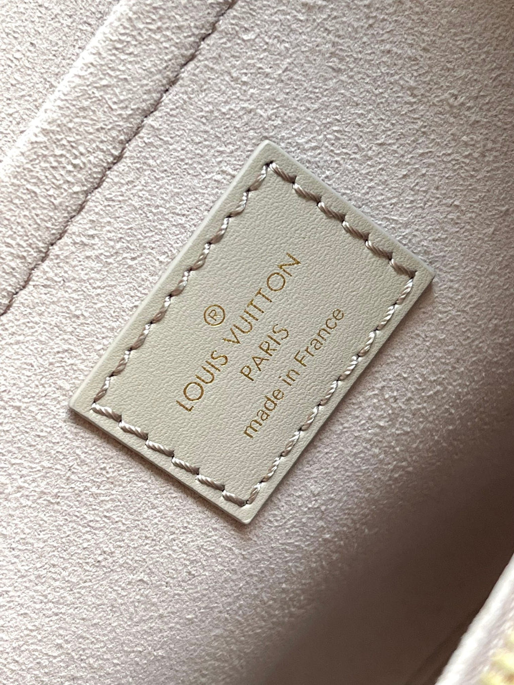 SAC BABYLONE 31 EN CUIR MONOGRAMME TOURTERELLE EMPREINTE