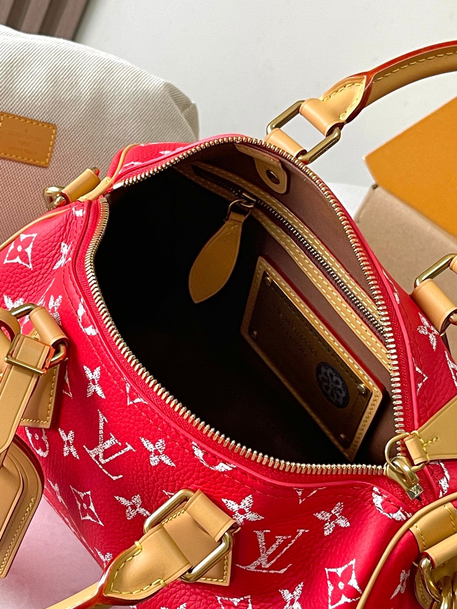 SPEEDY P9 BANDOULIÈRE 25 EN TOILE MONOGRAMME ROUGE QUINCAILLERIE DORÉ