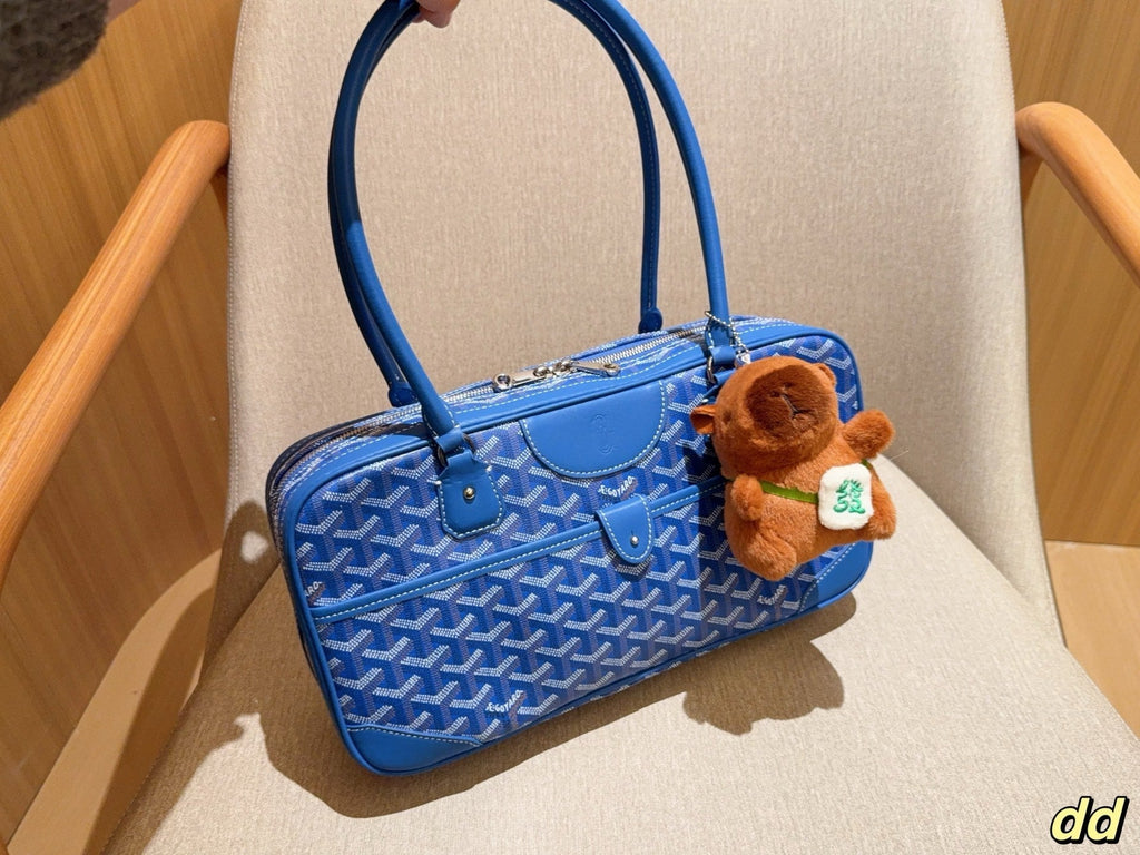 SAC SAINT MARTIN 35 EN TOILE GOYARDINE BLEUE ET CUIR DE VEAU