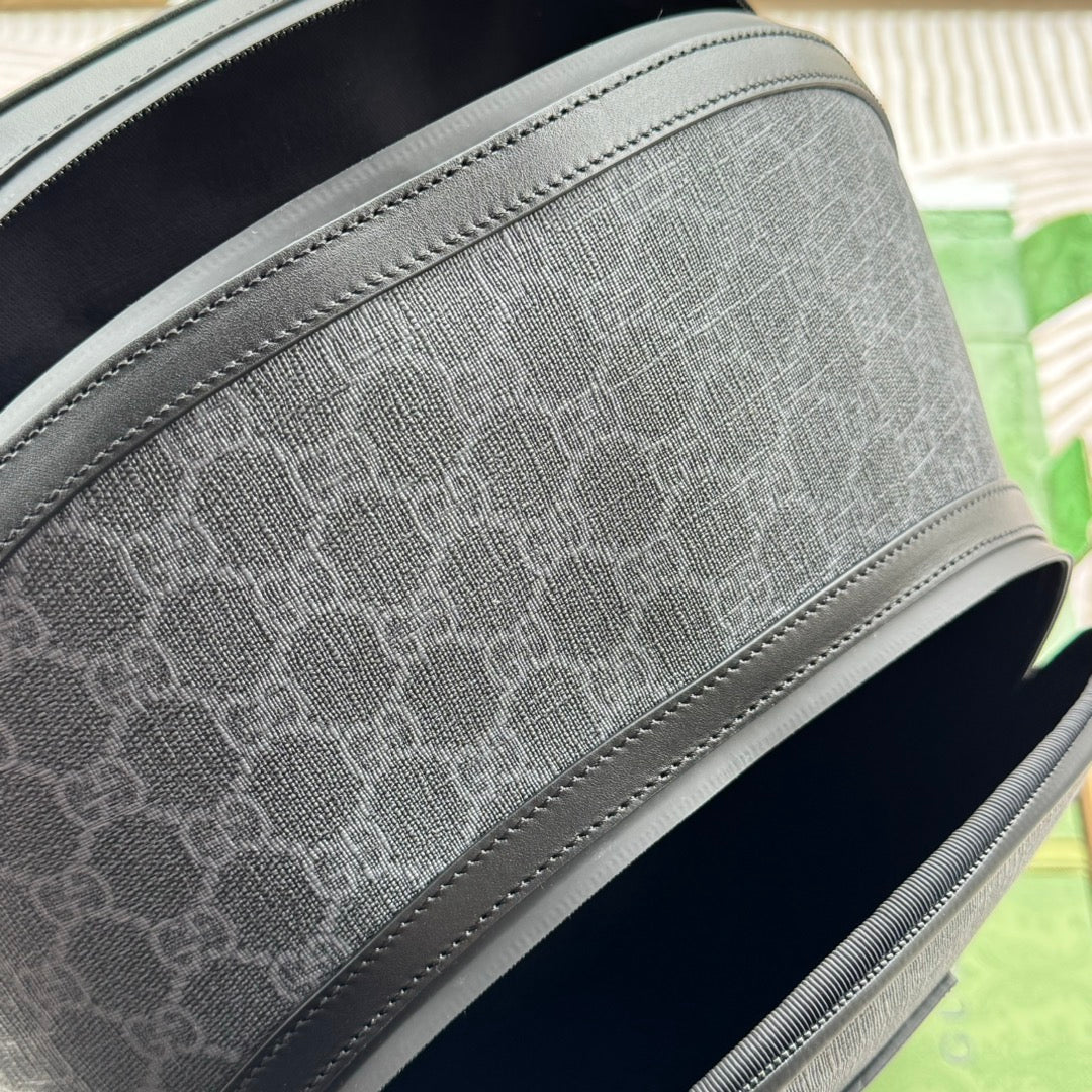 SAC À DOS 44 EN TOILE MONOGRAMME GRISE ET BORDURE EN CUIR NOIR