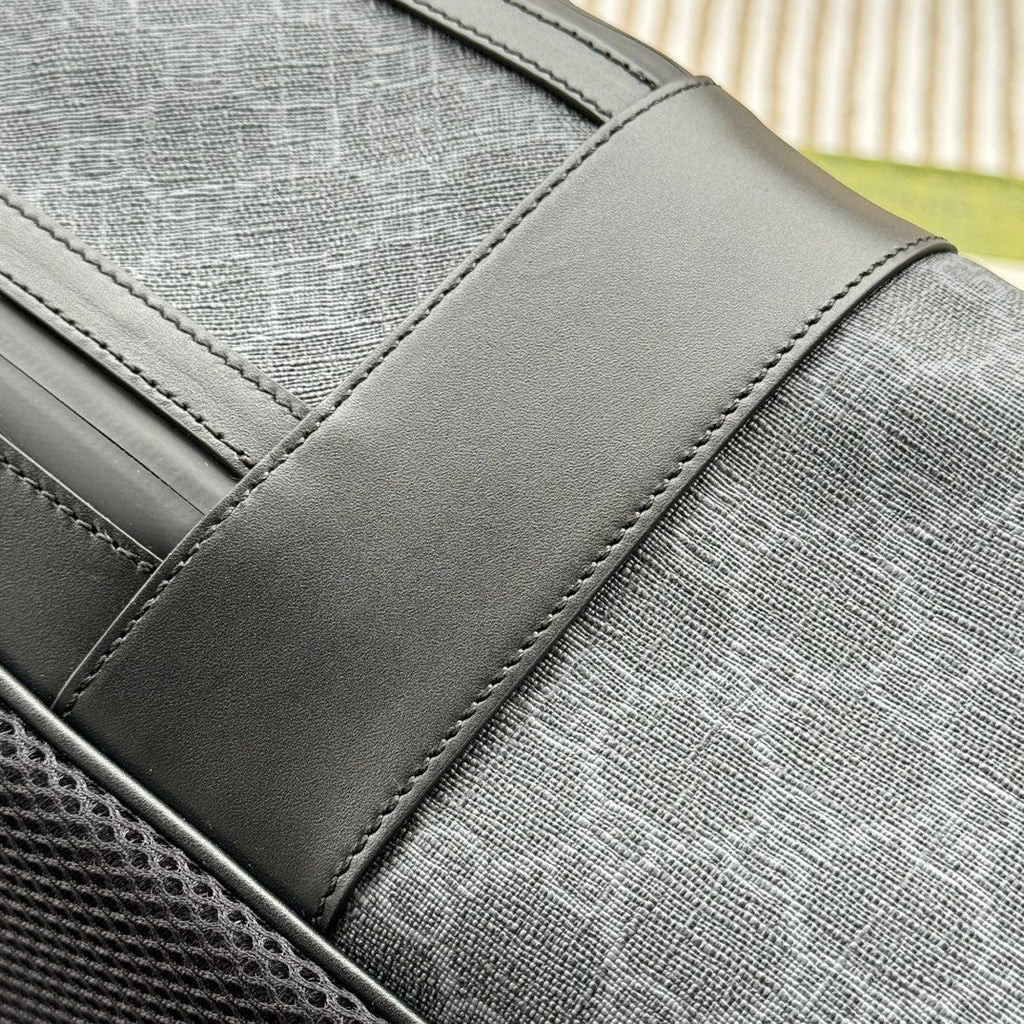 SAC À DOS 44 EN TOILE MONOGRAMME GRISE ET BORDURE EN CUIR NOIR