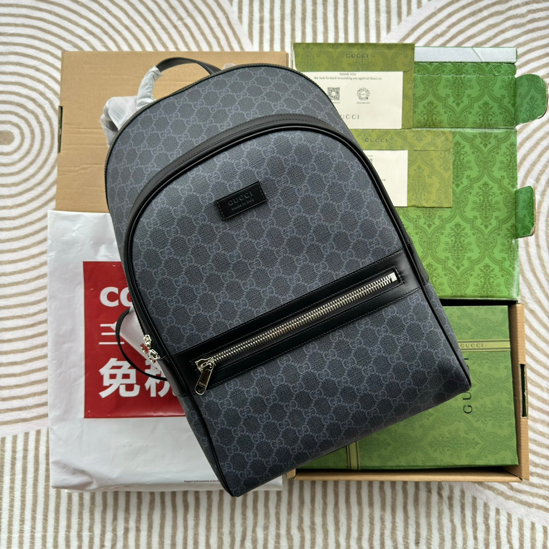 SAC À DOS 44 EN TOILE MONOGRAMME GRISE ET BORDURE EN CUIR NOIR