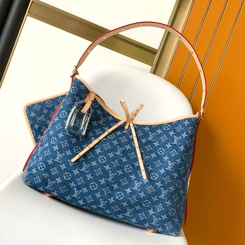 SAC FOURRE-TOUT MM 39 EN DENIM MONOGRAMME BLEU