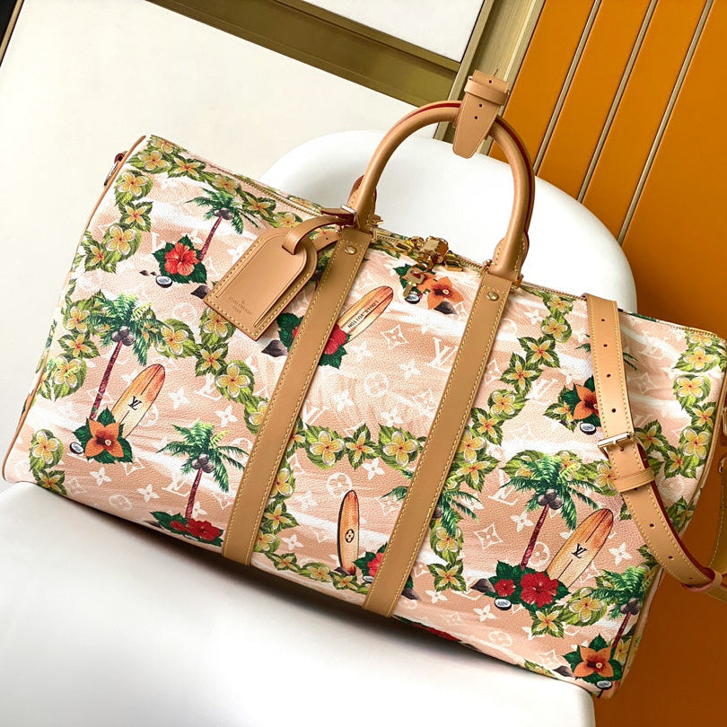 KEEPALL BANDOULIÈRE 50 EN TOILE SURFIN SABLE MOTIFS TROPICAUX MONOGRAMME