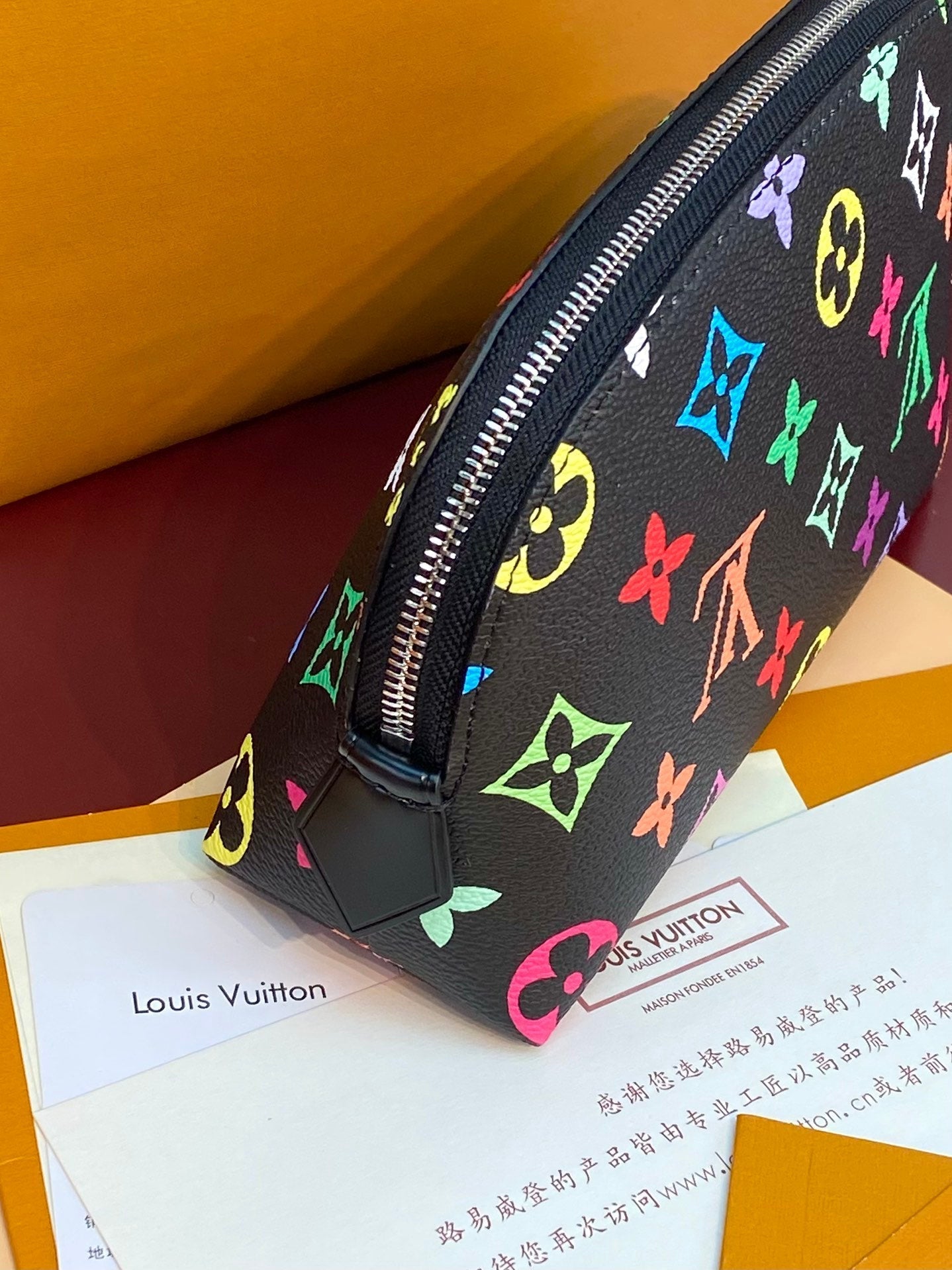TROUSSE À COSMÉTIQUES PM 19 EN TOILE MONOGRAMME COLORÉE