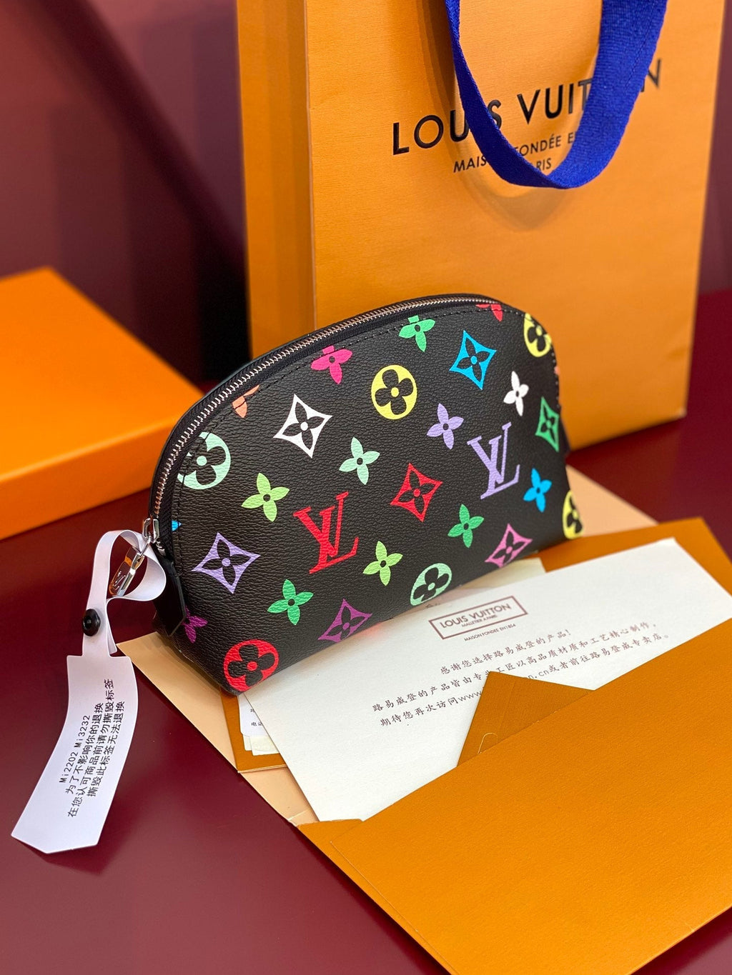 TROUSSE À COSMÉTIQUES PM 19 EN TOILE MONOGRAMME COLORÉE