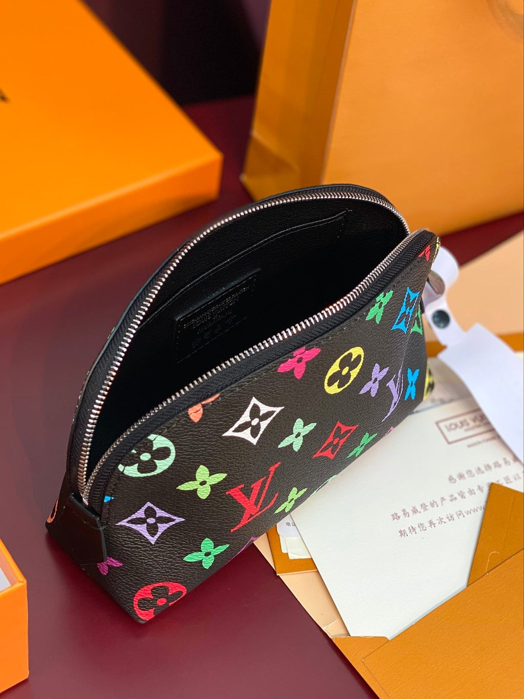 TROUSSE À COSMÉTIQUES PM 19 EN TOILE MONOGRAMME COLORÉE