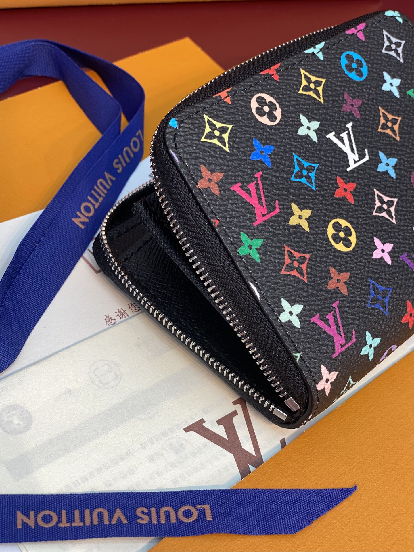 PORTE-MONNAIE LV X TM ZIPPY EN TOILE MONOGRAMME MULTICOLORE NOIRE