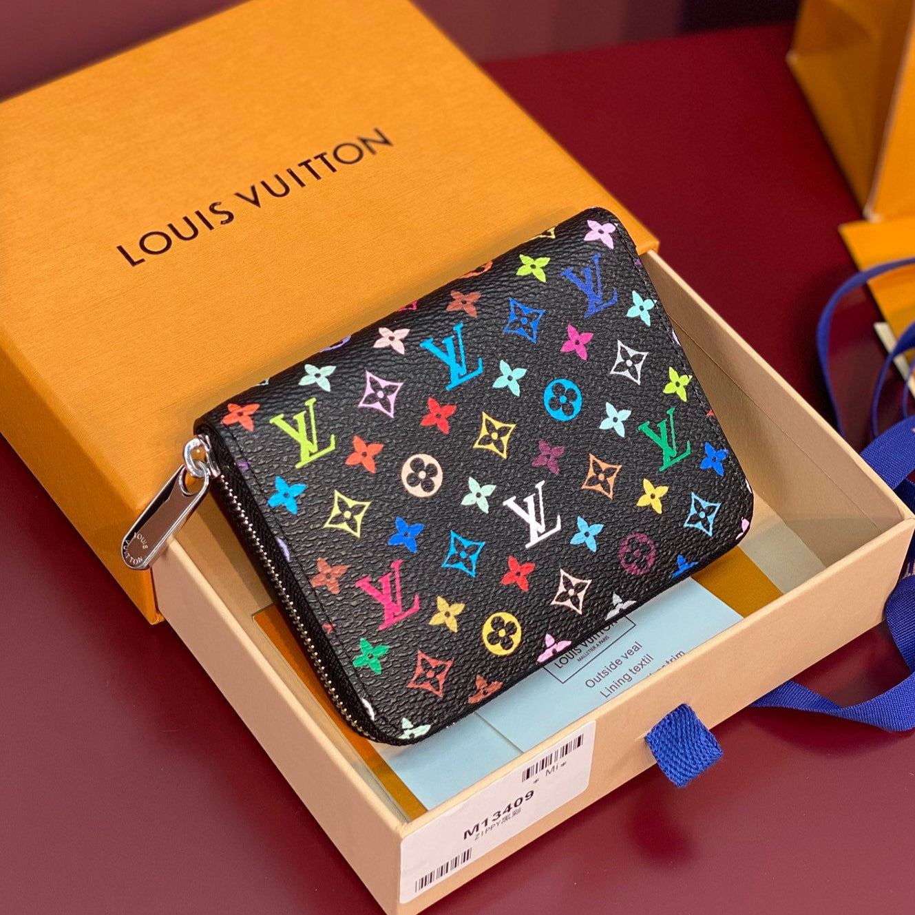 PORTE-MONNAIE LV X TM ZIPPY EN TOILE MONOGRAMME MULTICOLORE NOIRE