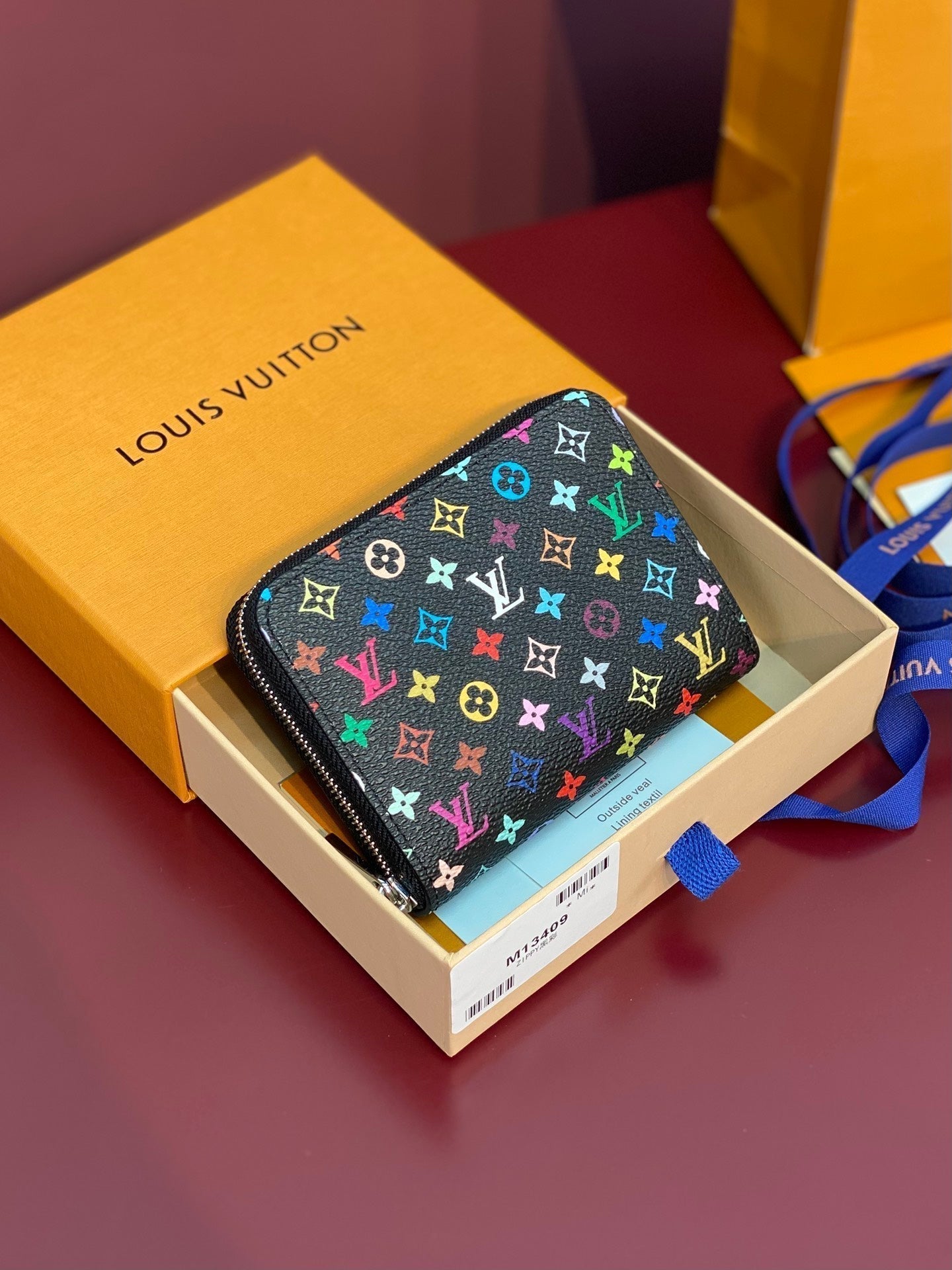 PORTE-MONNAIE LV X TM ZIPPY EN TOILE MONOGRAMME MULTICOLORE NOIRE