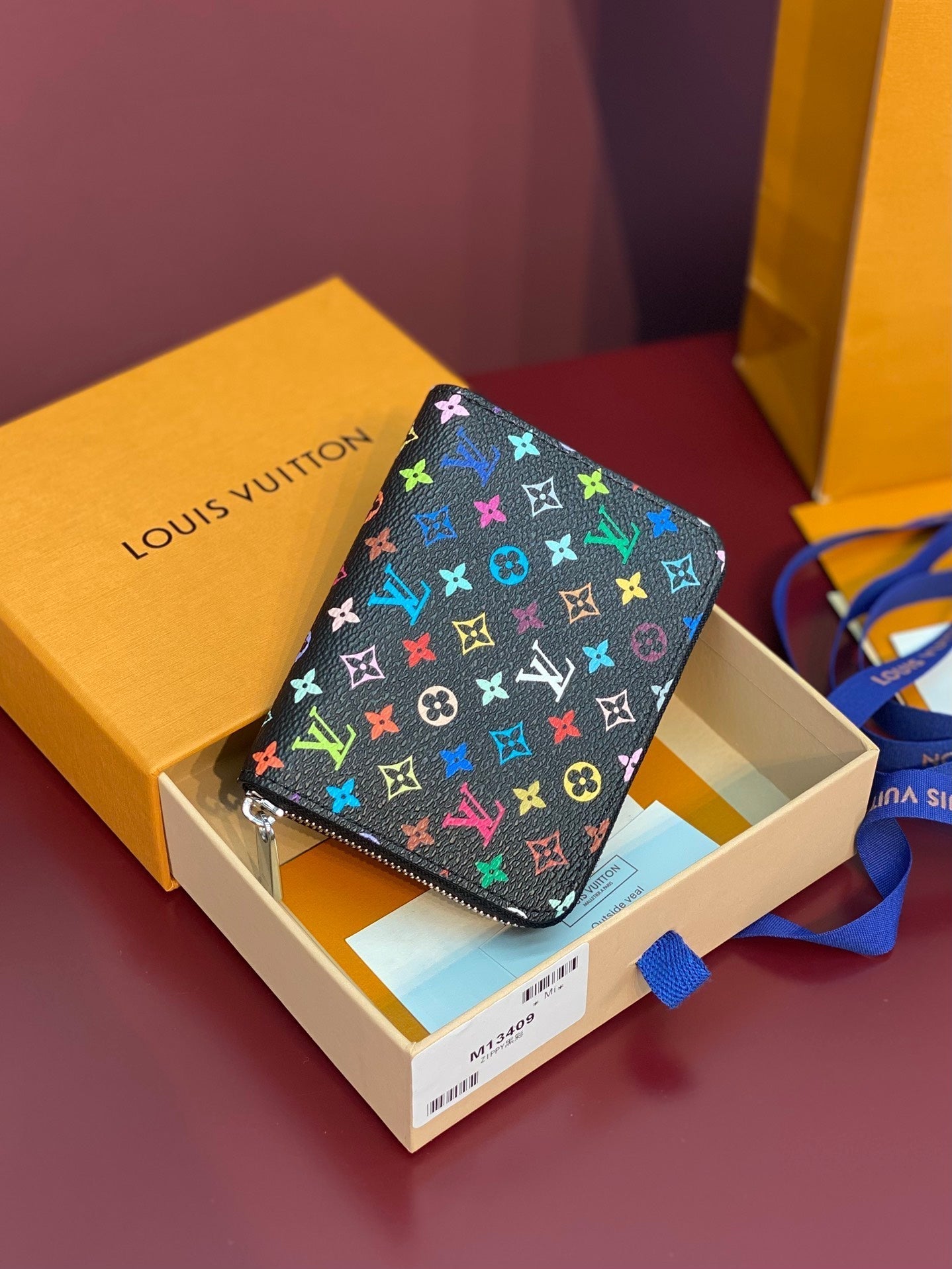 PORTE-MONNAIE LV X TM ZIPPY EN TOILE MONOGRAMME MULTICOLORE NOIRE