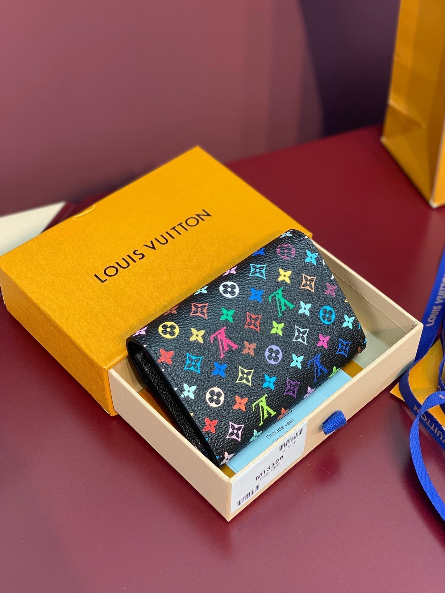 PORTE-MONNAIE LV X TM ROSALIE EN TOILE MONOGRAMME NOIRE ET MULTICOLORE
