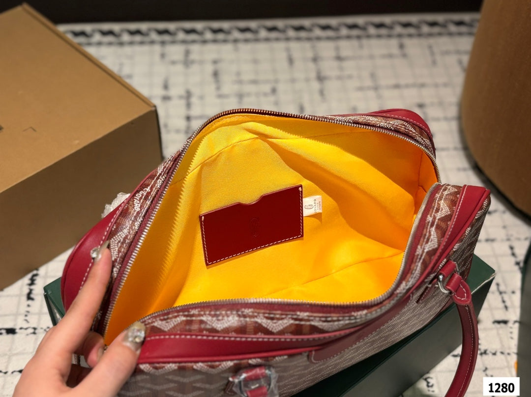 SAC SAINT MARTIN 35 EN TOILE GOYARDINE ROUGE BORDEAUX ET CUIR DE VEAU